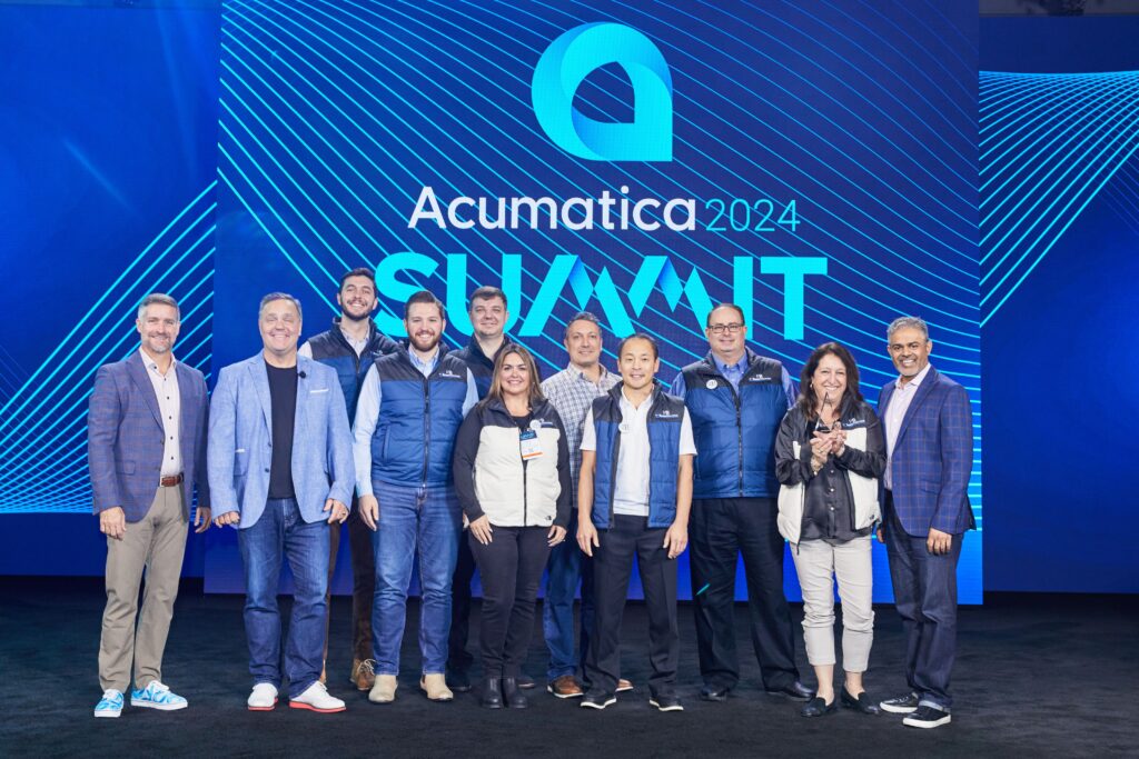 PC Bennett Solutions team accepting an Acumatica Cloud ERP MVP award at Summit 2025.