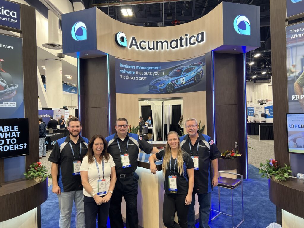 PC Bennett Solutions team in the Acumatica Cloud ERP booth at SEMA 2024.